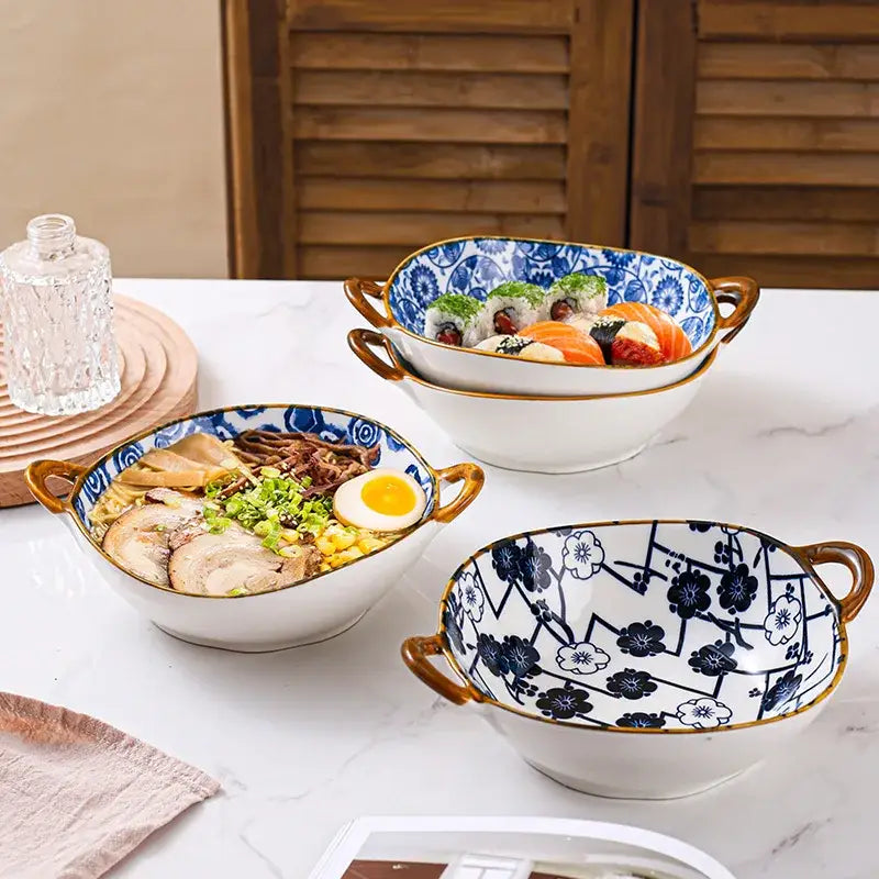 Three floral blue and white ceramic double ear ramen soup bowls with gold handles and traditional japanese patterns by decorbites