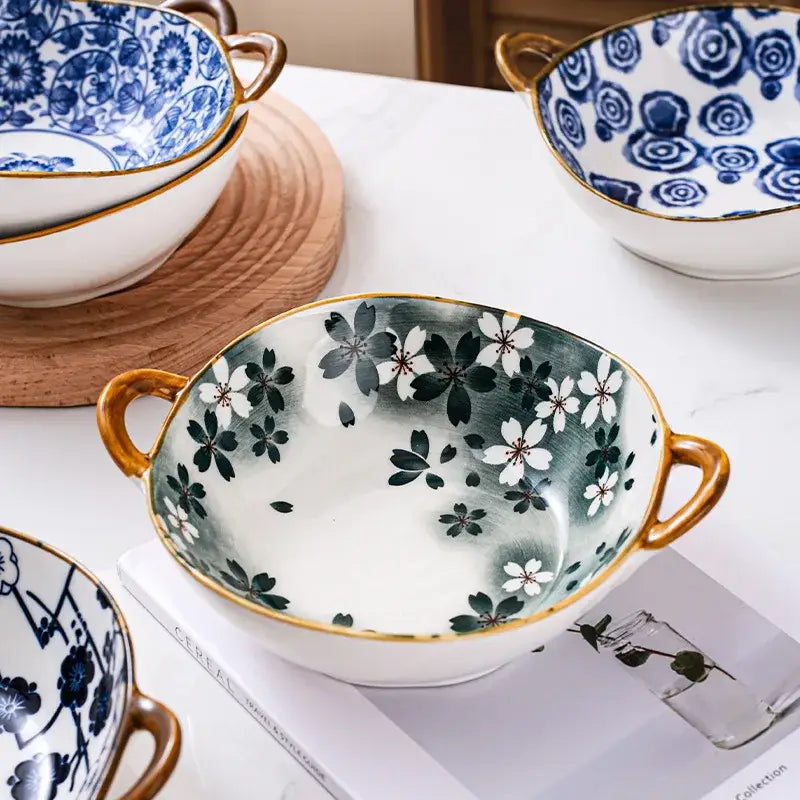 Floral blue and white ceramic double ear ramen soup bowl with gold handles and cherry blossom decorbites ceramic double