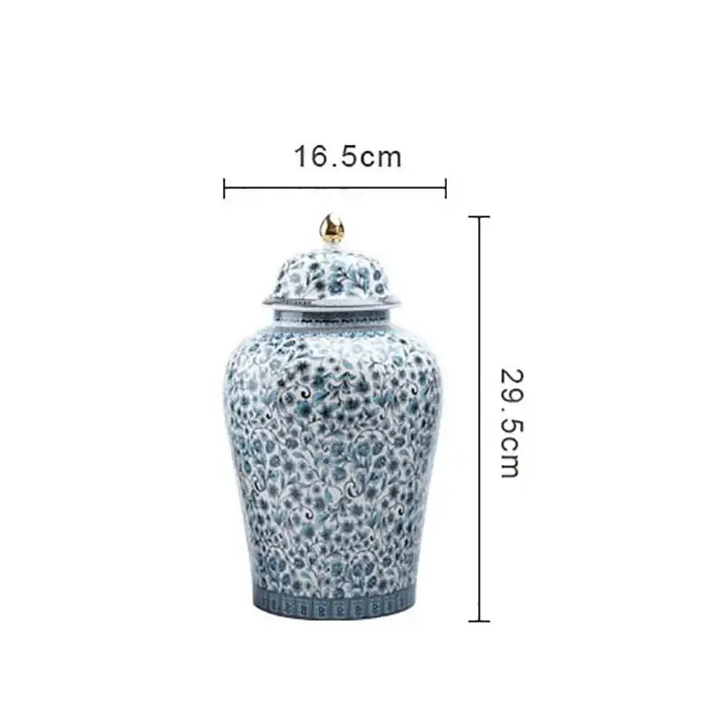 A porcelain blue white ceramic ginger jar with floral pattern and gold finial for living room decorbites decor