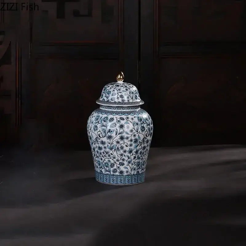 Floral blue and white ceramic ginger jar with intricate patterns and gold-toned lid knob for living room decorbites blue white decor