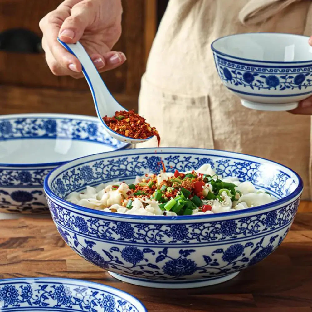 Blue and white ceramic soup bowl with intricate floral patterns by decorbites for dining room noodle dish use