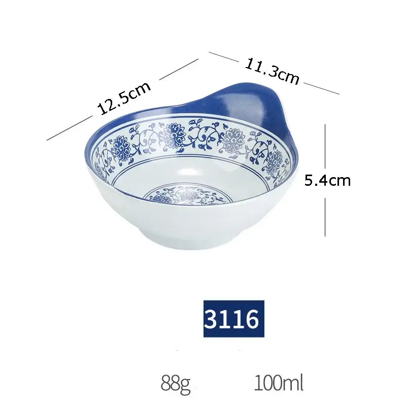 A white imitation porcelain dinner set bowl with blue floral pattern and solid blue handle, 12.5cm diameter, 5.4cm deep