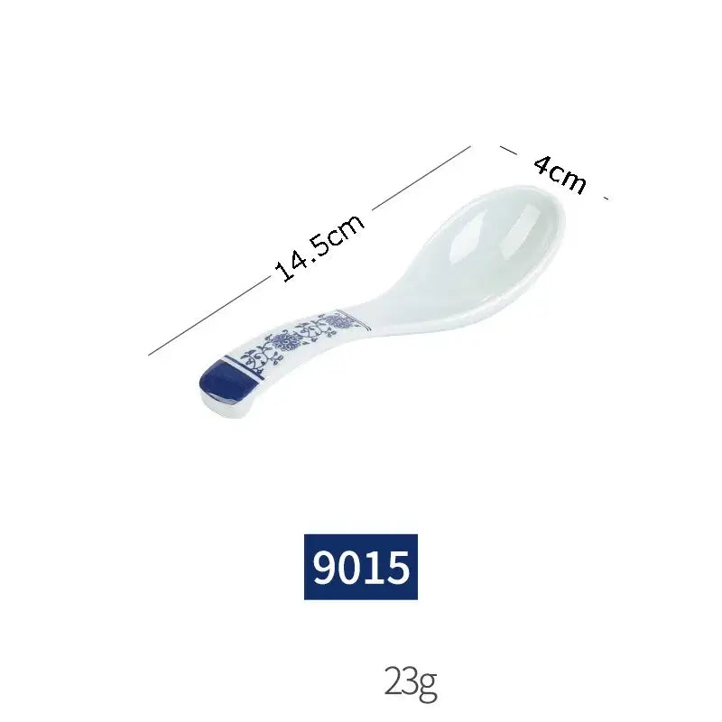 White imitation porcelain spoon rest with blue floral pattern and navy accent from floral blue and white dinner set