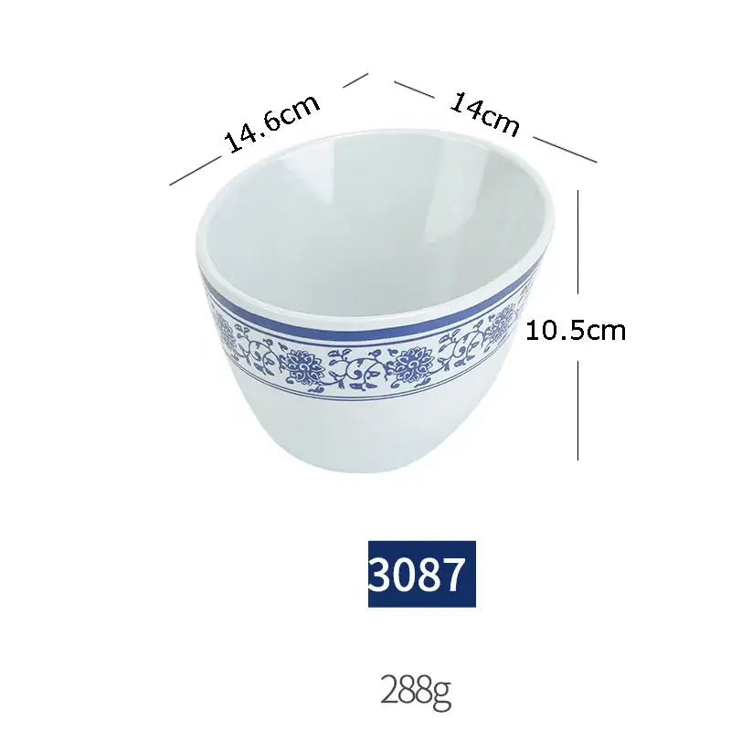 White ceramic bowl with blue floral pattern rim from floral blue and white imitation porcelain dinner set