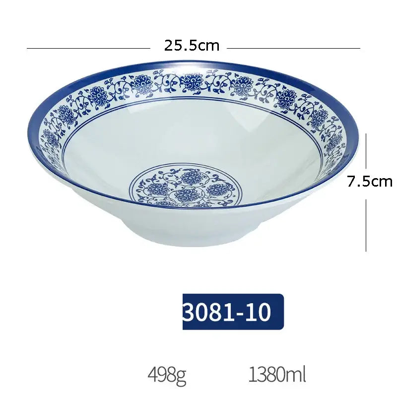A white imitation porcelain dinner set bowl with intricate blue floral patterns and a glossy finish for dining room use
