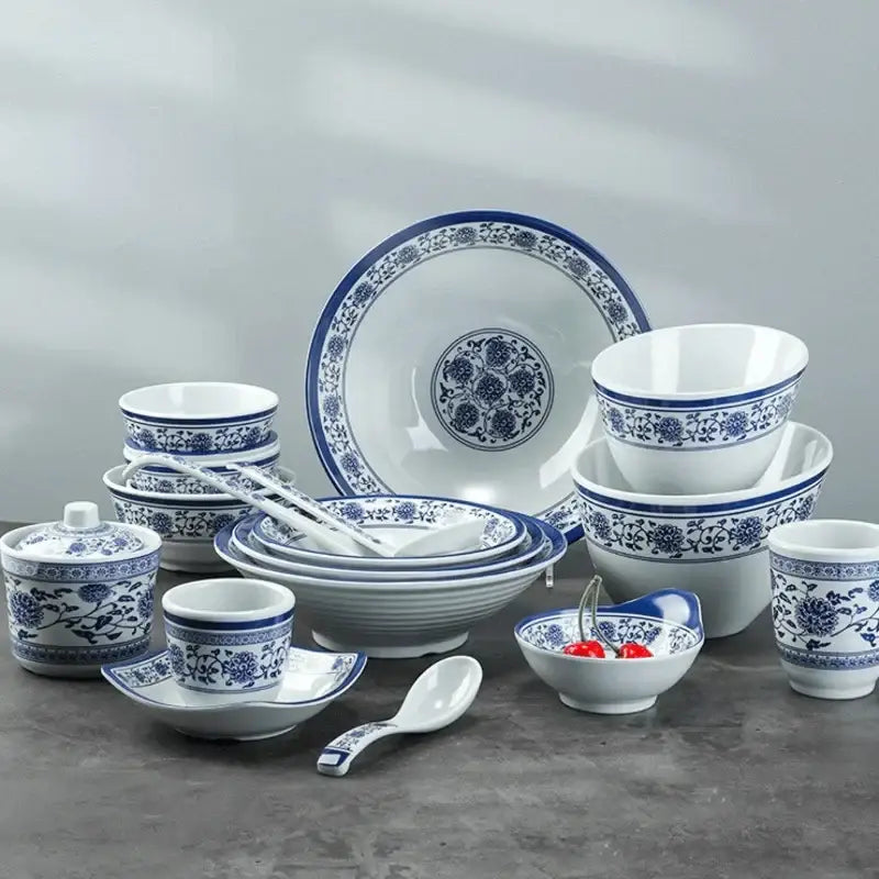 Floral blue and white imitation porcelain dinner set with intricate floral patterns for dining room use