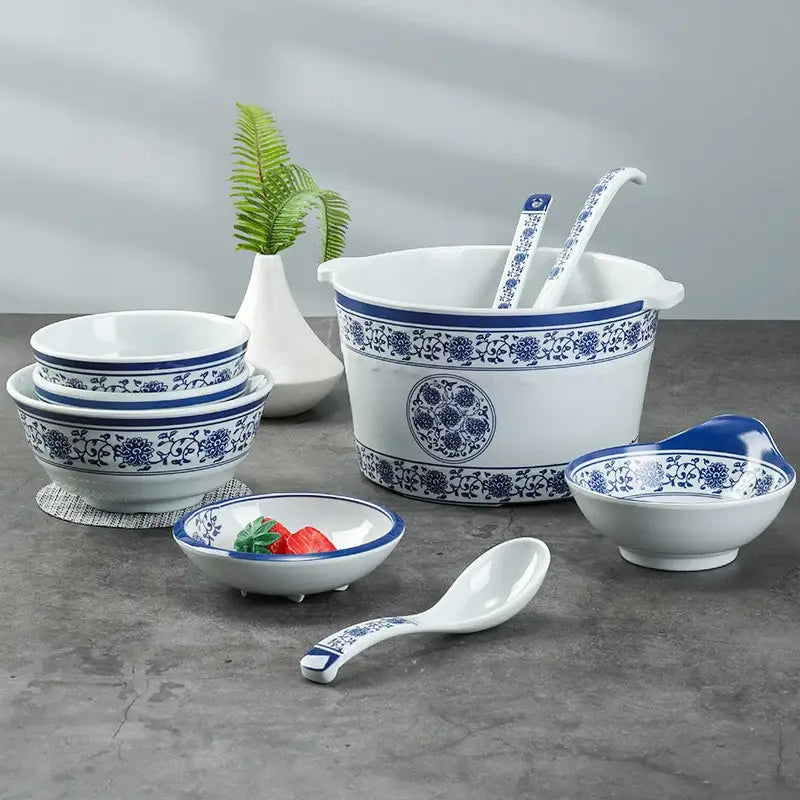 Floral blue and white imitation porcelain dinner set with intricate floral patterns for dining room use