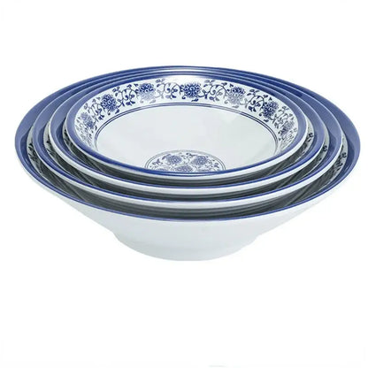 Set of five nested ceramic bowls with blue floral patterns in a white imitation porcelain dinner set