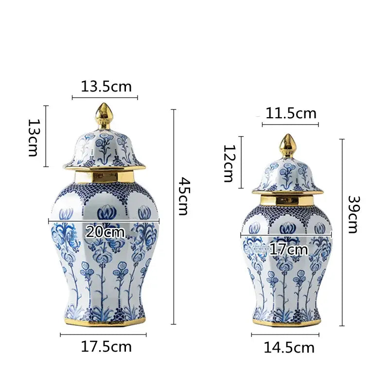 Two elegant blue and white porcelain general jar vases with gold-trimmed lids and intricate floral patterns for living room decor