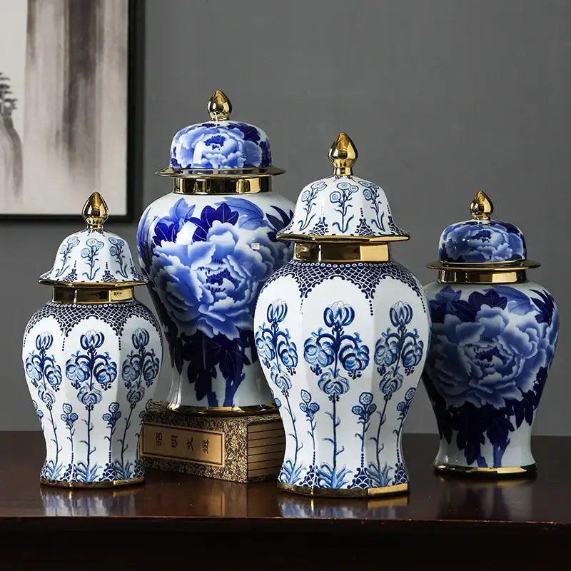 Blue and white porcelain general jar vase with gold-trimmed lids featuring intricate floral patterns for living room decor