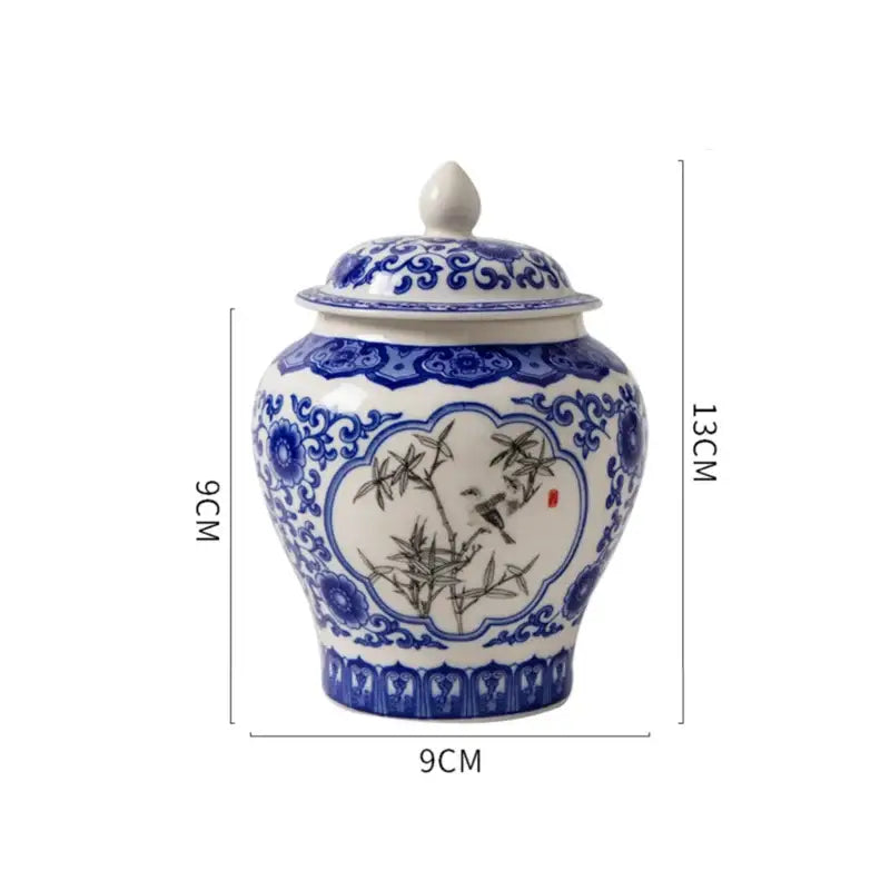 Floral blue and white porcelain tea canister with intricate bamboo and bird hand-painted designs for decorbites blue white collection