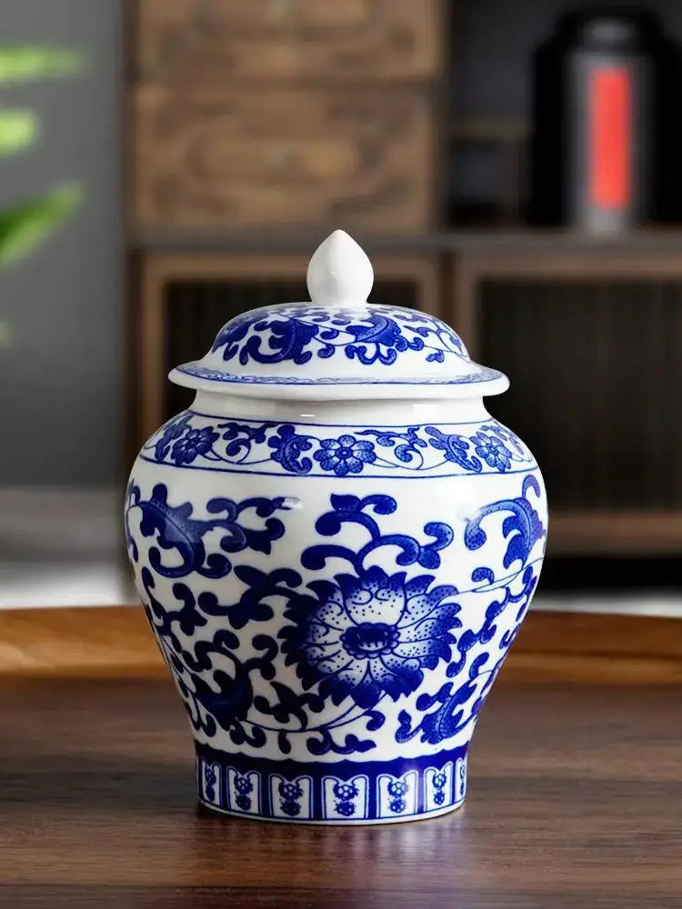 Floral blue and white porcelain tea canister with intricate floral patterns and matching lid for decorbites blue white decor