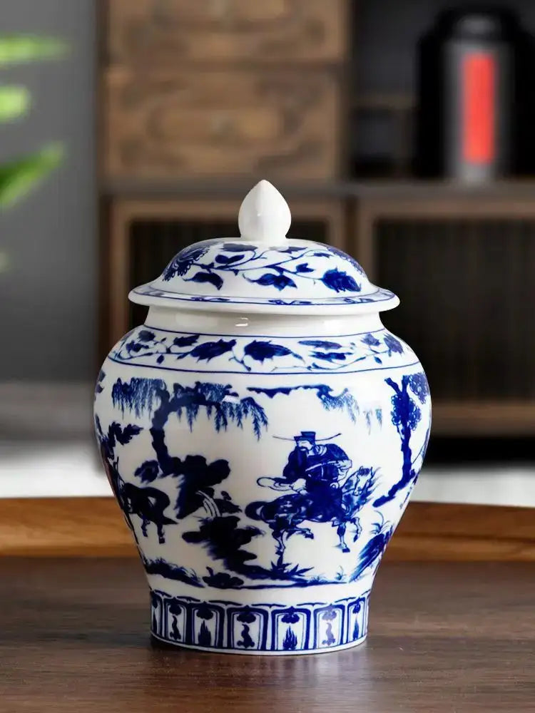 Floral blue and white porcelain tea canister with lid featuring hand-painted figures on horseback for decorbites blue white collection