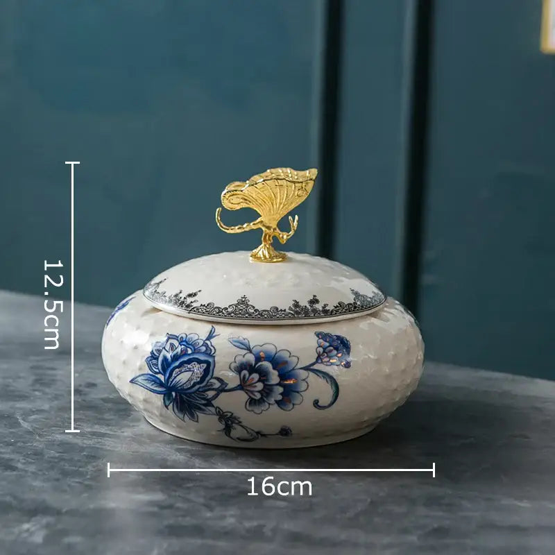 White ceramic floral jewelry box with blue patterns and gold leaf-shaped decorbites dragonfly lid for bedroom storage