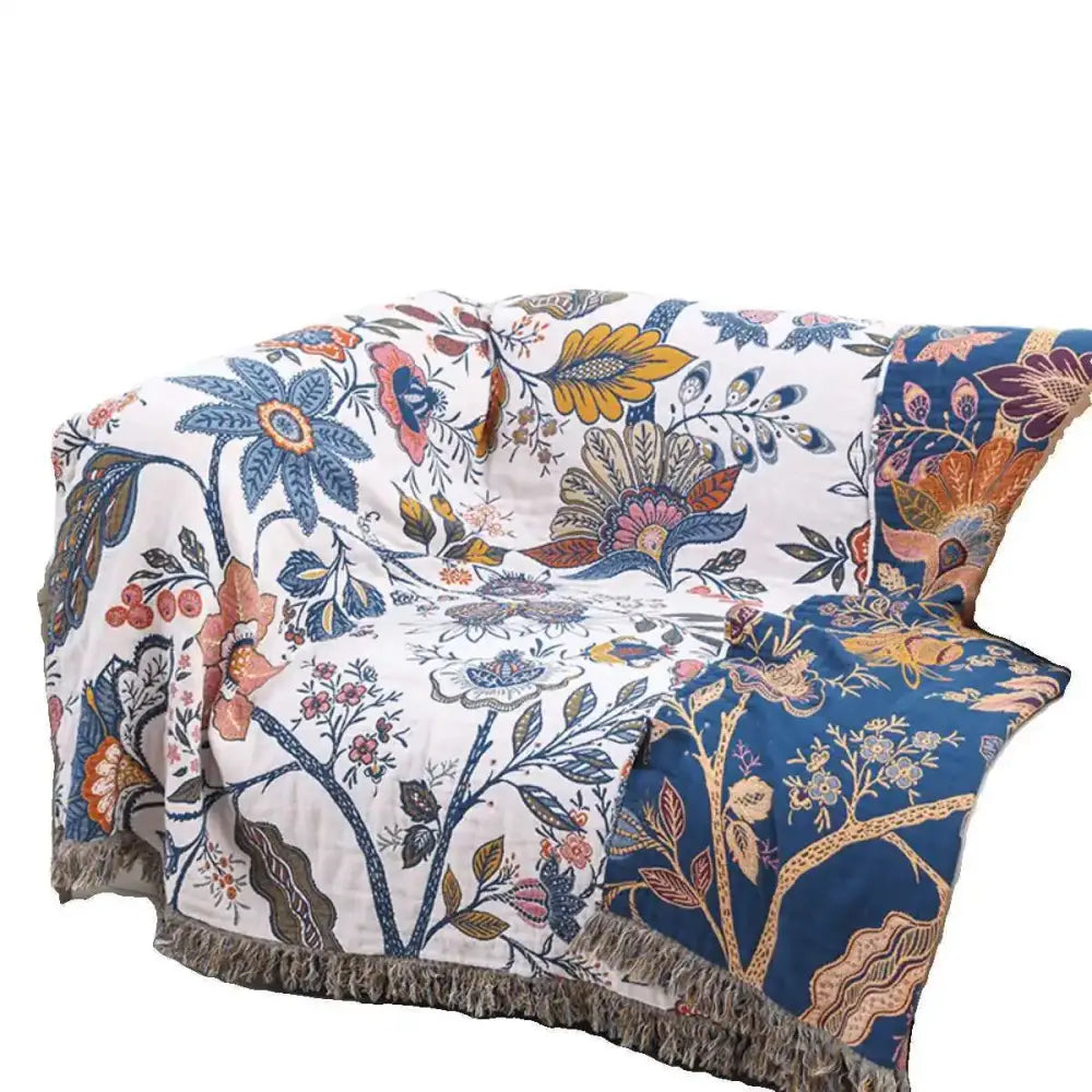 Floral cotton bohemian throw blanket with white base, vibrant blossoms, gray fringe, perfect double cotton bohemian cover
