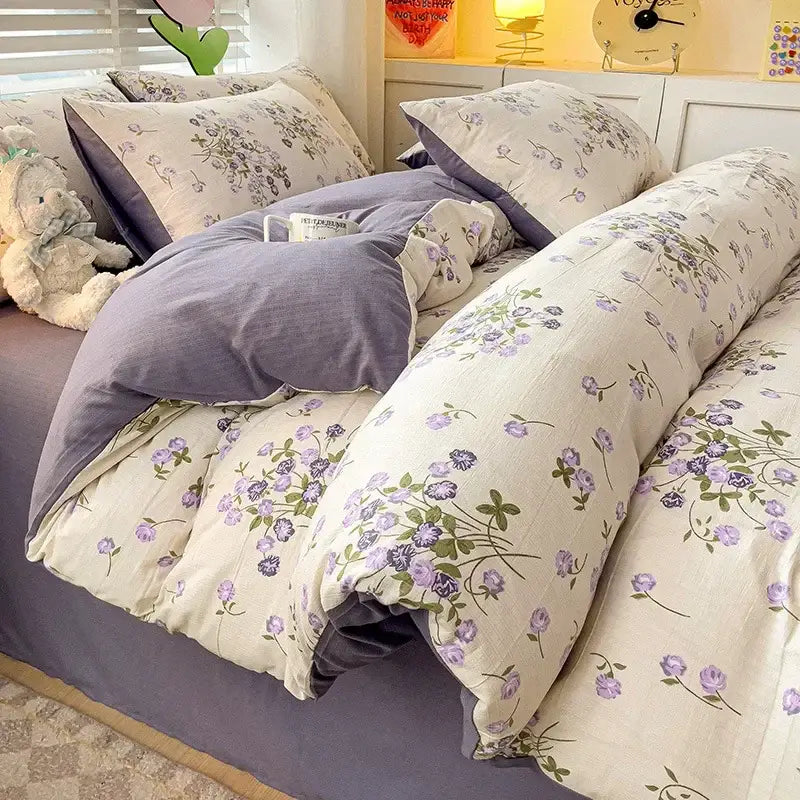 Floral cream and peach double layer cotton quilt cover set with lavender floral design featuring delicate purple blossoms
