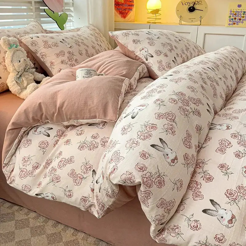 Pastel pink and cream floral bunny quilt cover set made of soft cotton for a floral cream and peach bedroom