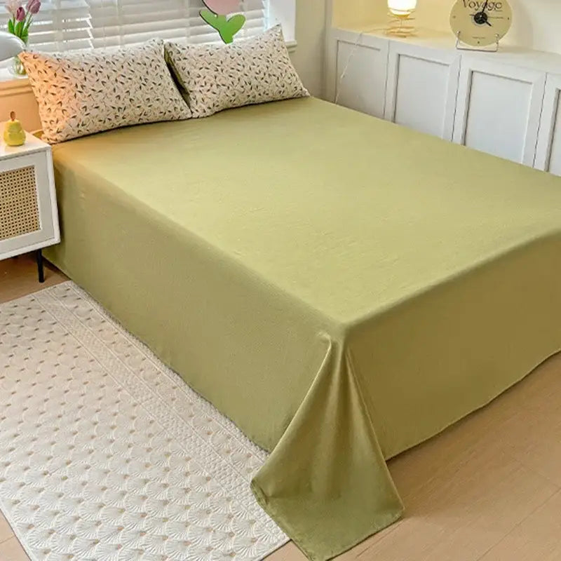Floral cream and peach double layer cotton quilt cover set with a soft olive green smooth quilt cover sheet