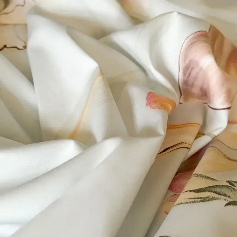 Floral cream and caramel egyptian cotton bedding set featuring soft off-white fabric with peach and olive floral pattern