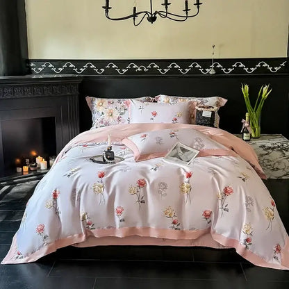 Pink floral satin bedding set with rose and hydrangea patterns on blush background with peach piping in egyptian cotton bedding set