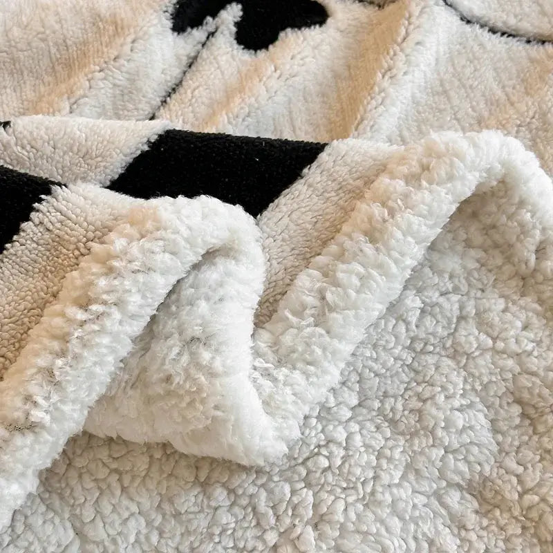 Floral cream jacquard lamb wool blanket with plush white sherpa and black beige cow print living room throw