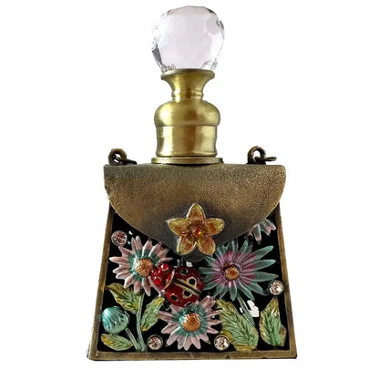 Decorative gold-toned enamel perfume bottles with colorful floral and ladybug design metal handicraft collection