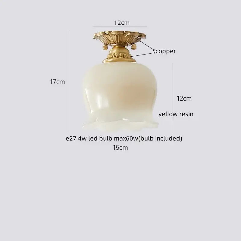 Floral etched glass led ceiling lamp with golden copper base and translucent yellow resin globe for living room