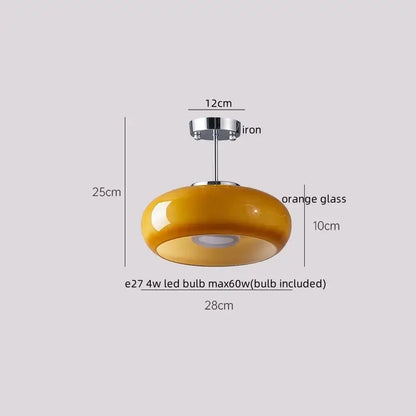 A sleek modern ceiling lamp with a glossy orange glass led ceiling shade and polished chrome fixture for living rooms
