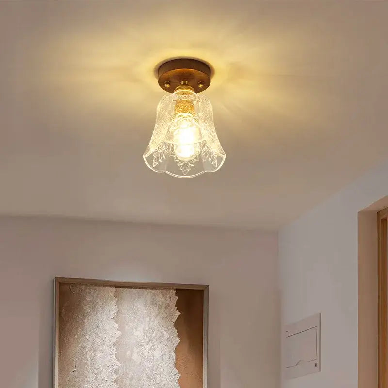 A warm-toned vintage ceiling lamp with brass base and floral etched glass shade for living room led ceiling lamp