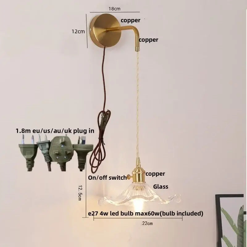 Floral glass copper led wall sconce with brass finish clear glass shade and attached cord for bathroom lighting