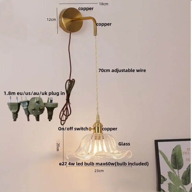 Floral glass copper led wall sconce featuring a delicate bell-shaped glass pendant with brass-finished copper mounting bracket