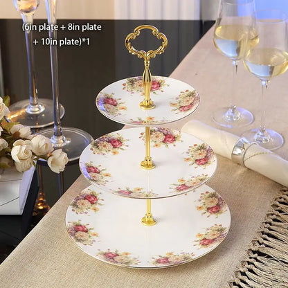 Three-tiered fruit plates set with floral gold bone china plates and ornate gold-toned handle for dining room use