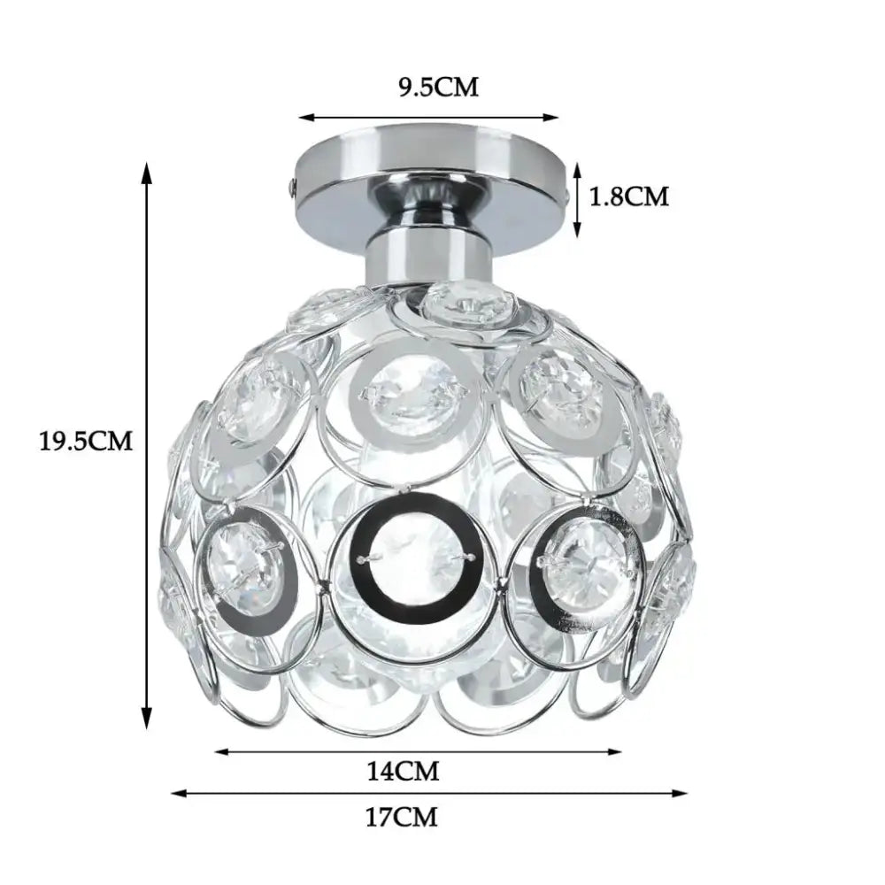 A chrome-finished crystal led ceiling chandelier with clear faceted crystals in overlapping circular patterns