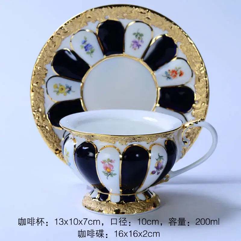 Elegant porcelain tea cup saucer set with black white and gold floral detailing and gilded rim for dining room use