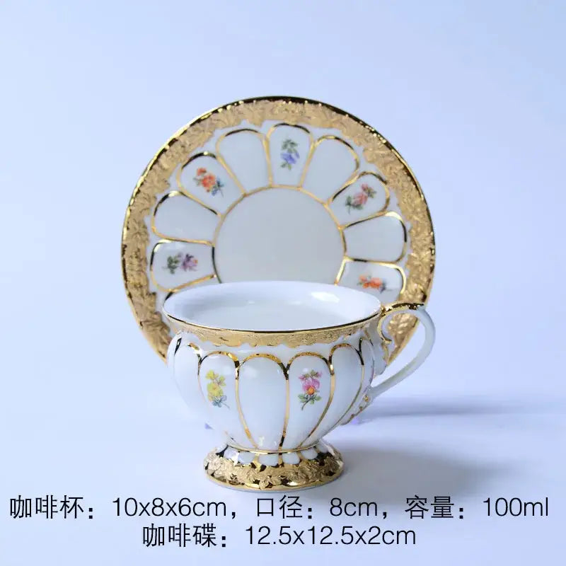 White porcelain tea cup saucer set with delicate floral design and gold trim for elegant dining room drinkware