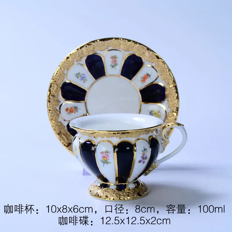 Elegant porcelain tea cup saucer set with navy blue and gold-trimmed floral patterns for dining room drinkware