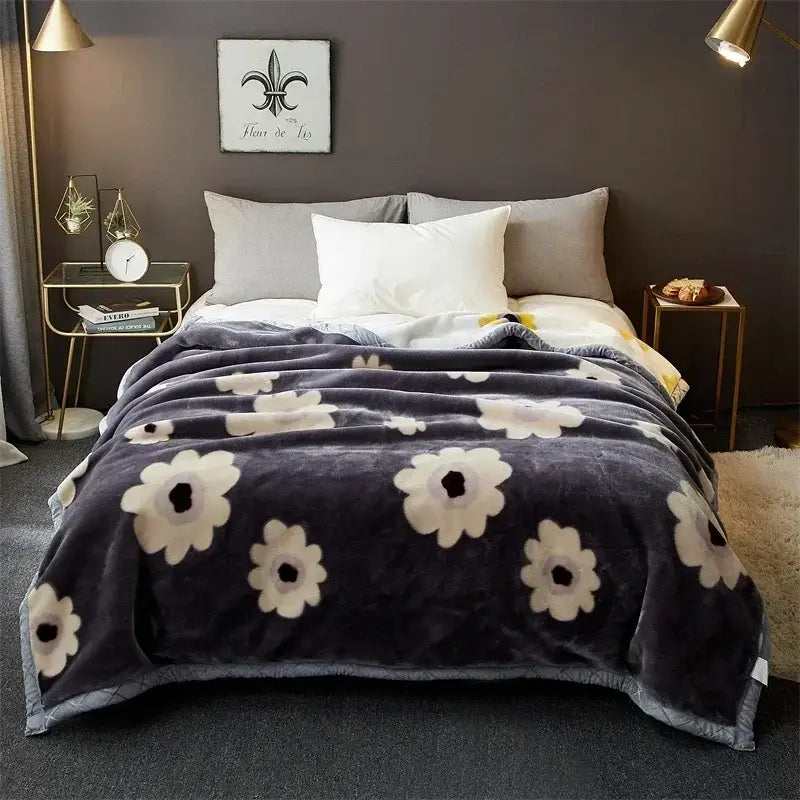 Dark gray plush decorbites cozy flocked raschel blanket with large white flowers and black centers for bedroom bedding