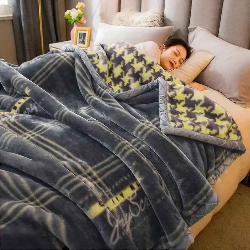 A cozy flocked raschel blanket with dark gray lime green houndstooth and muted plaid reversible design for bedding decor