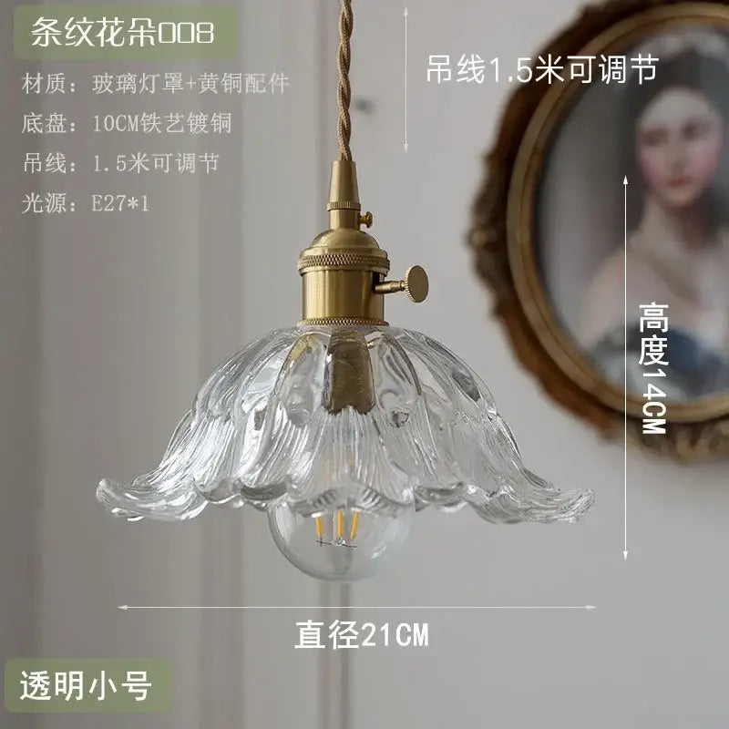Floral green and champagne glass pendant light with fluted petal design and brass hardware for dining room use