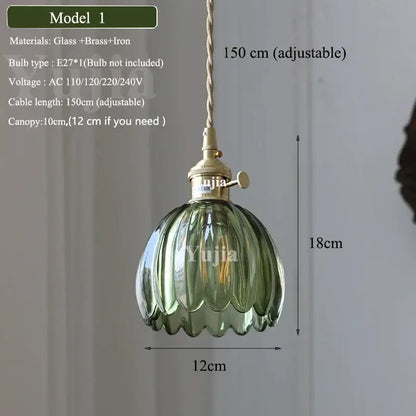 Floral green glass and brass pendant light with ribbed green glass shade and adjustable cord for kitchen use