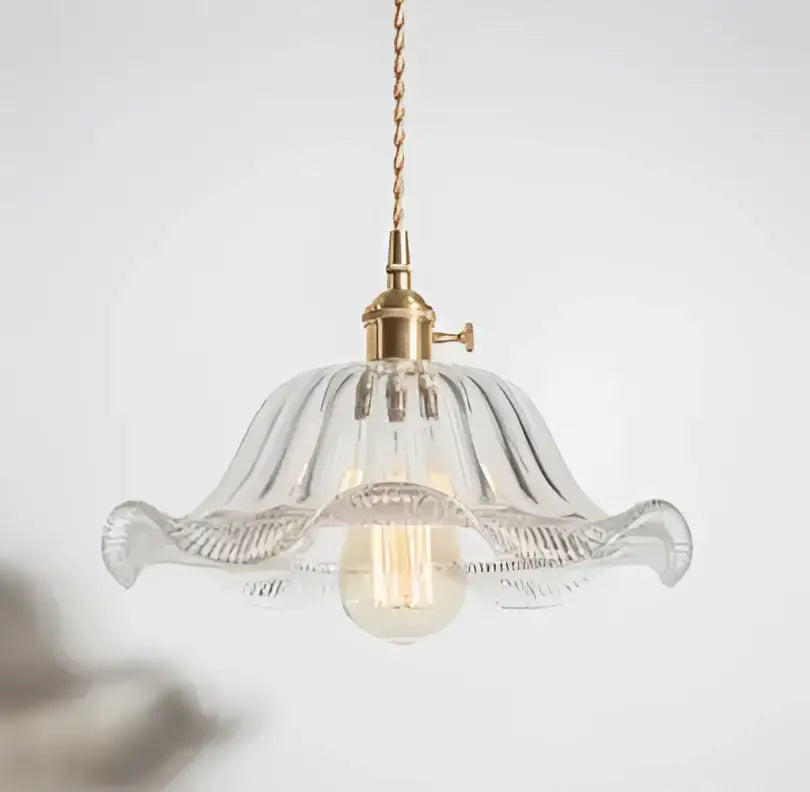 Floral green glass pendant light with fluted petal design and golden brass finish ideal for dining room pendant lights