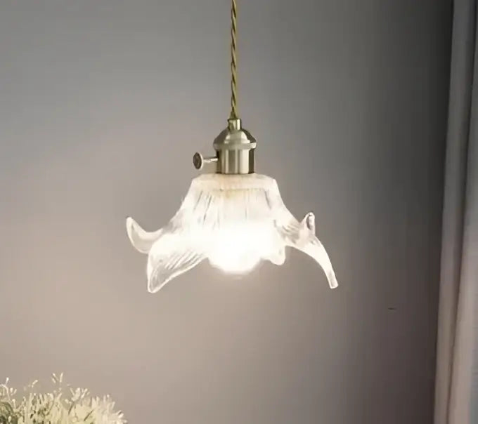 Floral green glass pendant light with frosted white petal design and golden brass finish for dining room pendant lights