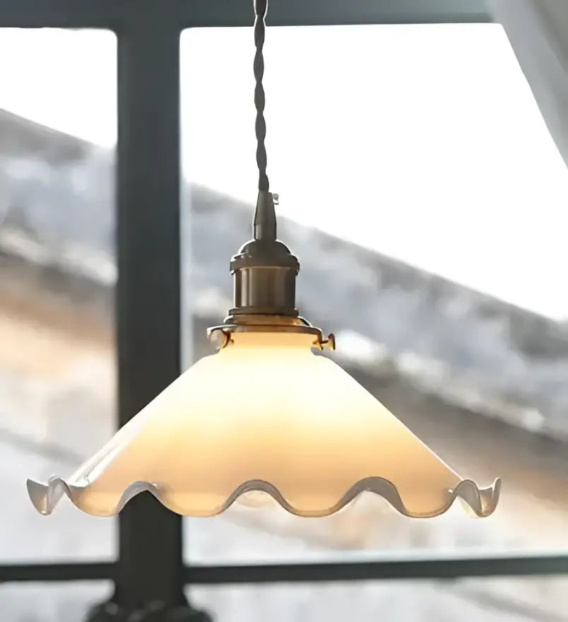 Antique brass-finished pendant light with warm frosted scalloped glass shade for dining room glass pendant lights