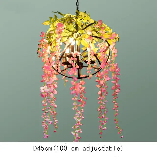 A floral green plant lighting chandelier with a black metal frame and pink yellow flowers for dining room decorbites green plant