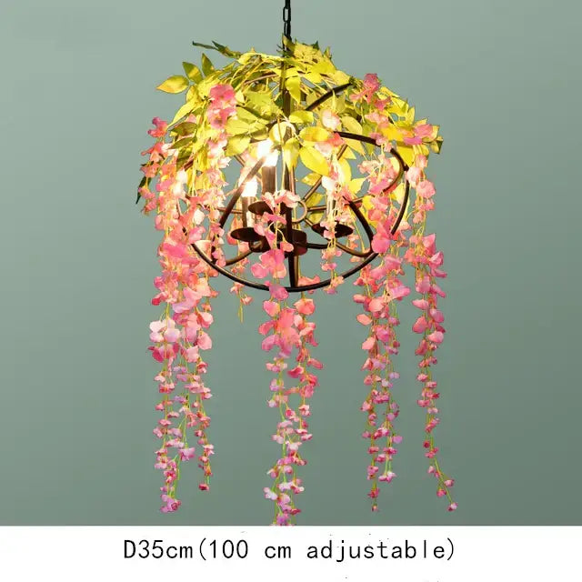 A delicate pink and green plant lighting chandelier with black metal frame for dining room decorbites green plant lighting