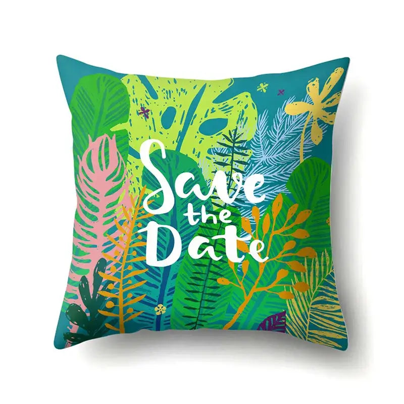 Floral green tropical leaves pillow cover with vibrant layered foliage and save the date script on plush fabric decorbites green tropical