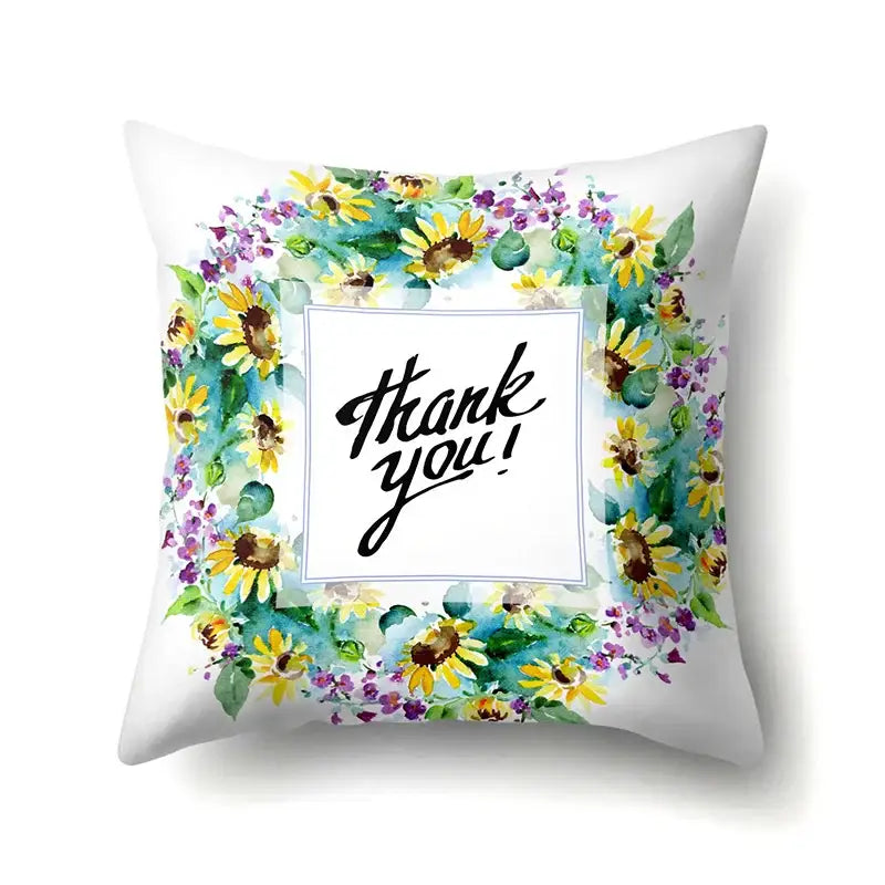 White throw pillow cover with watercolor sunflower wreath and thank you script for decorbites green tropical leaves decor