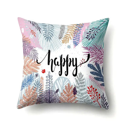 Colorful pillow cover with decorbites green tropical leaves and happy script for seasonal bedroom decor
