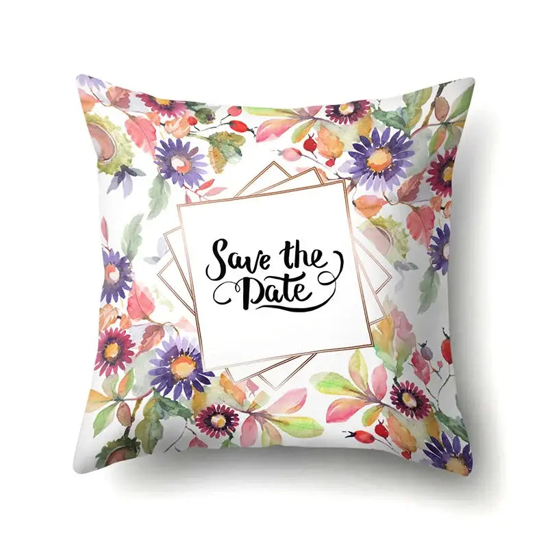 Square pillow cover with vibrant floral pattern and save the date text ideal for decorbites green tropical leaves decor