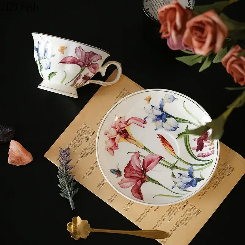 A delicate porcelain mug set with decorbites iris pattern featuring vibrant pink purple and blue floral illustrations